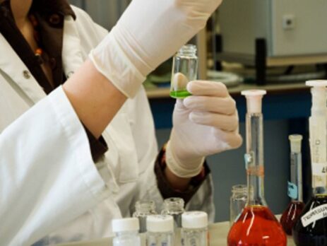 Lab technician conducting chemical analysis