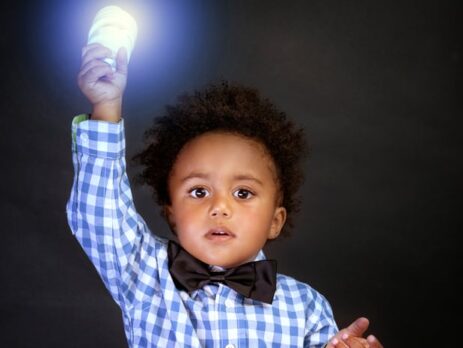 Child holding up a light