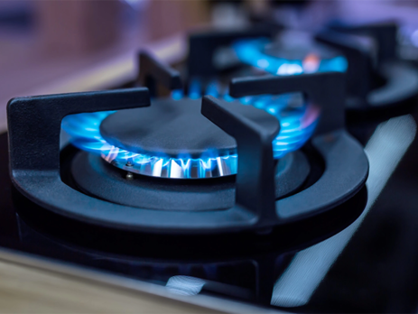 Close up of a lit gas hob