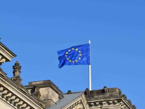 EU flag flying above a building