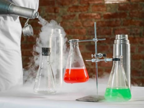 Beakers and smoke demonstrating temperature control in chemistry