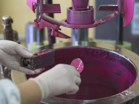 A worker wearing latex gloves manufacturing purple paint in a factory.||ReAgent's 2.5l pack size of absolute ethanol||A pie chart showing air composition percentages