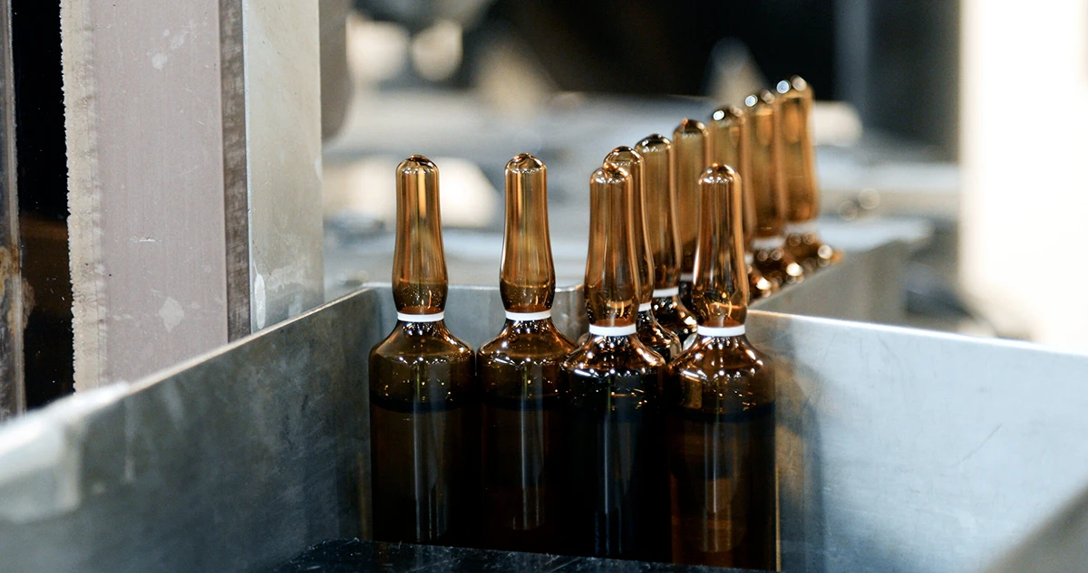 Several ampoules stacked after being filled