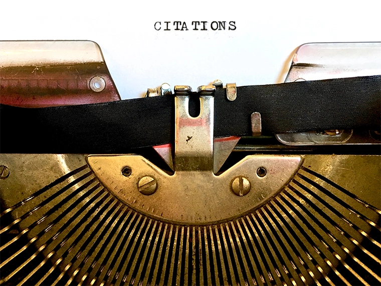 Old typewriter with the word 'citations' typed out on paper