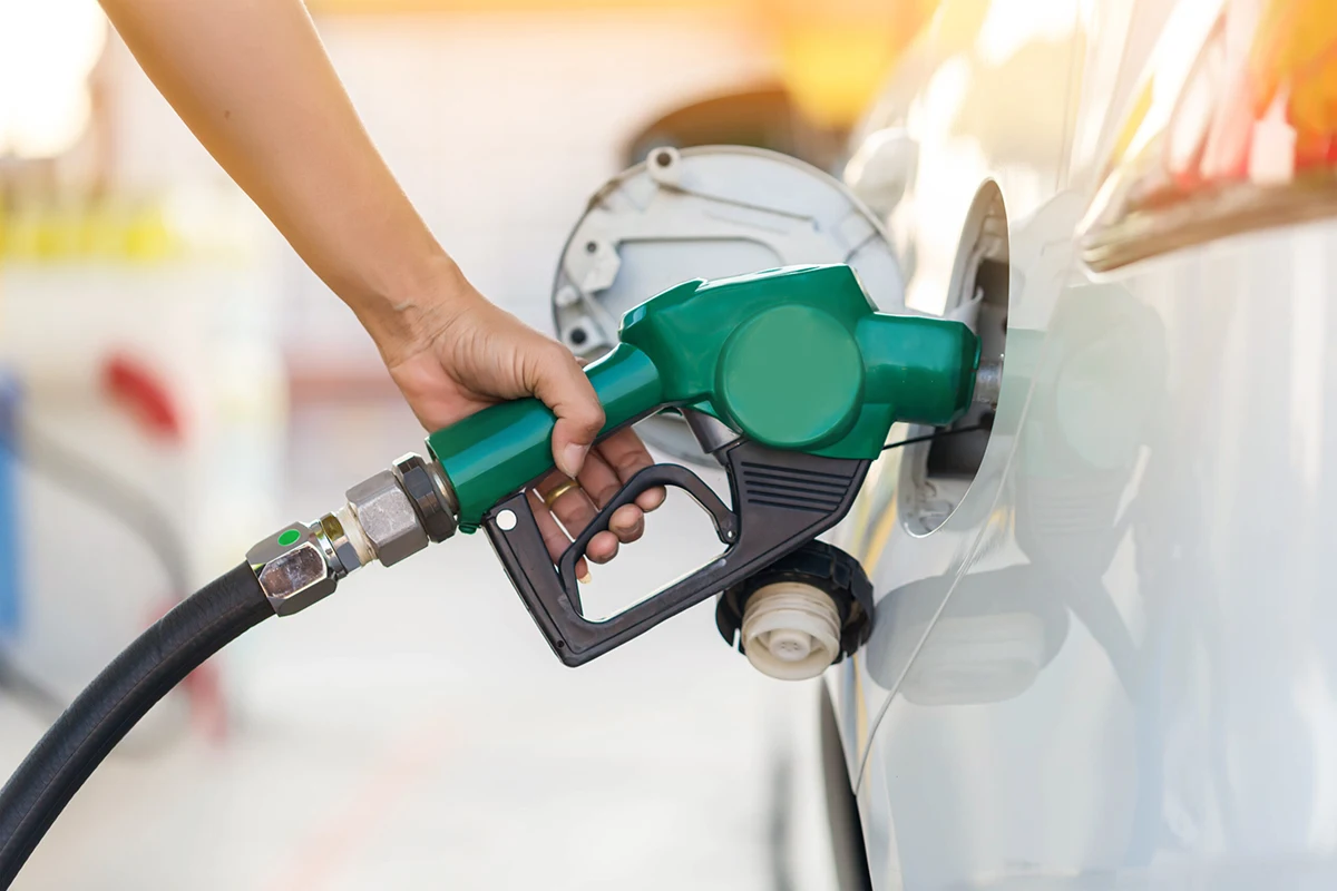Person filing car with petrol