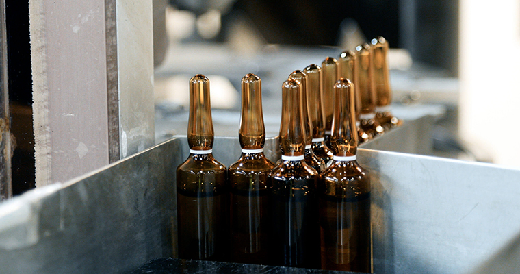Several ampoules stacked after being filled