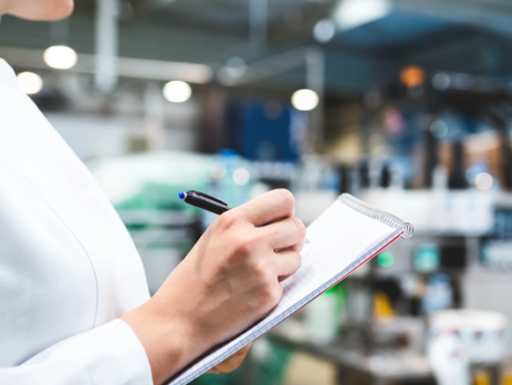 A person performing a quality check.