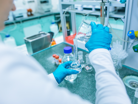 Scientist testing drugs in a lab at a pharmaceutical company