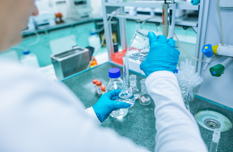 Scientist testing drugs in a lab at a pharmaceutical company