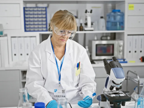 Scientist holding test tube in a lab