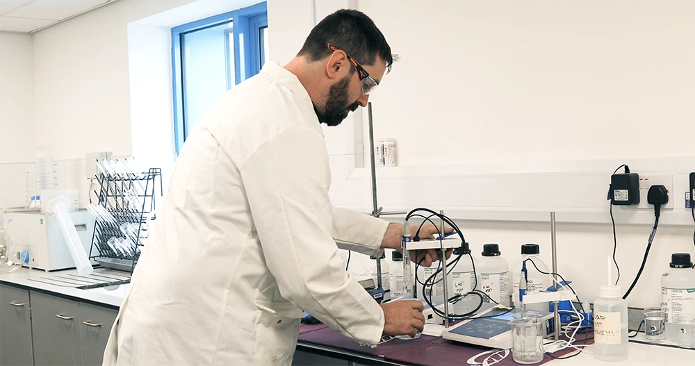 Conducting experiments in ReAgent's modern chemistry lab