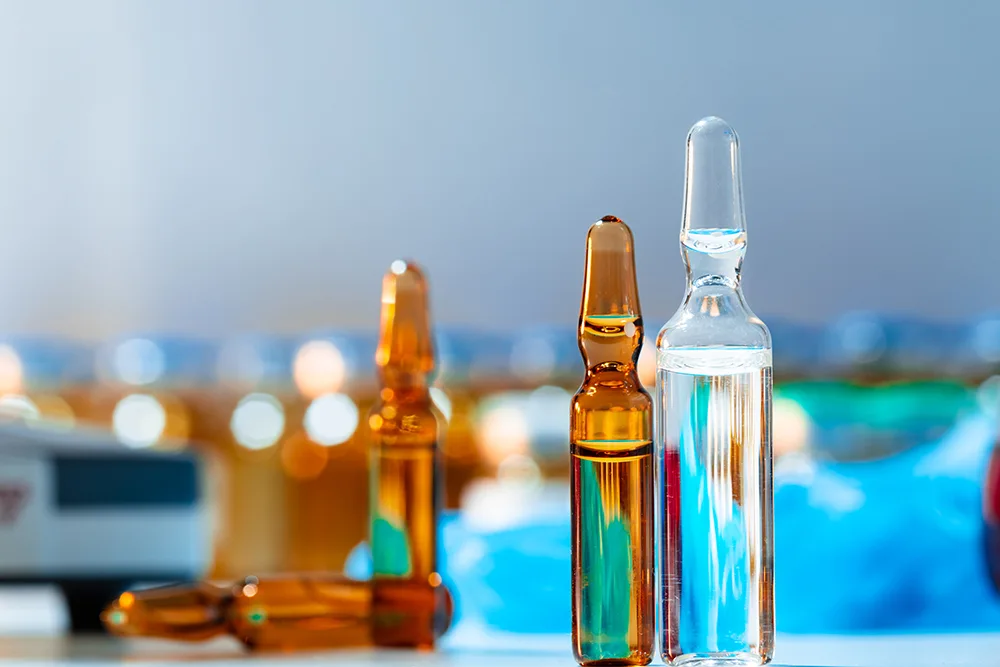 Plain ampoule vials for injections close up