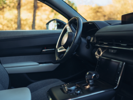 Luxury car interior with dashboard and car seats