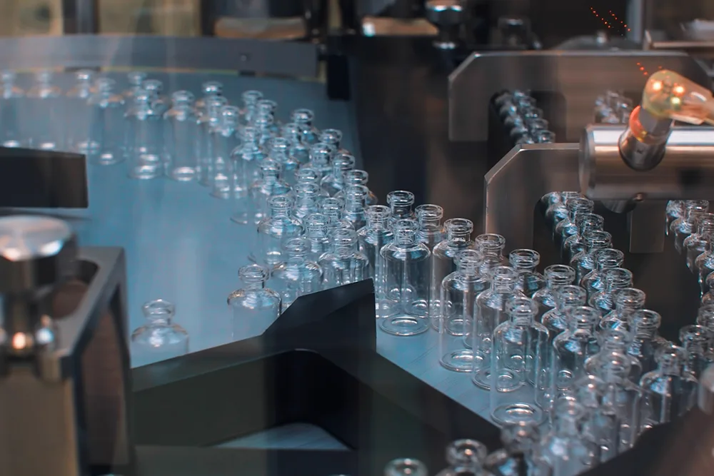 glass sterile vials on the line of a pharmaceutical