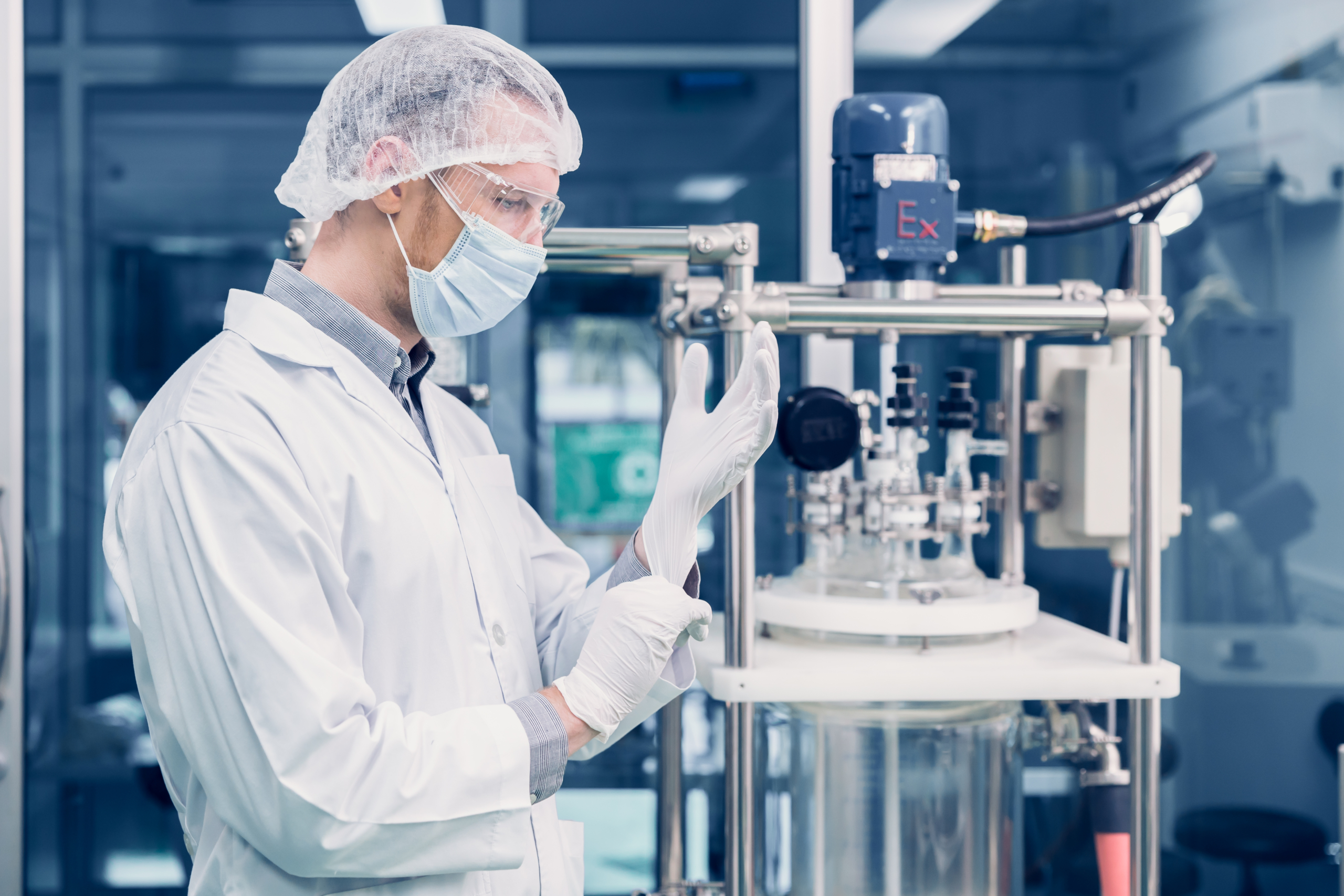 Scientist performing pharmaceutical calibrations and instrumentation upgrades