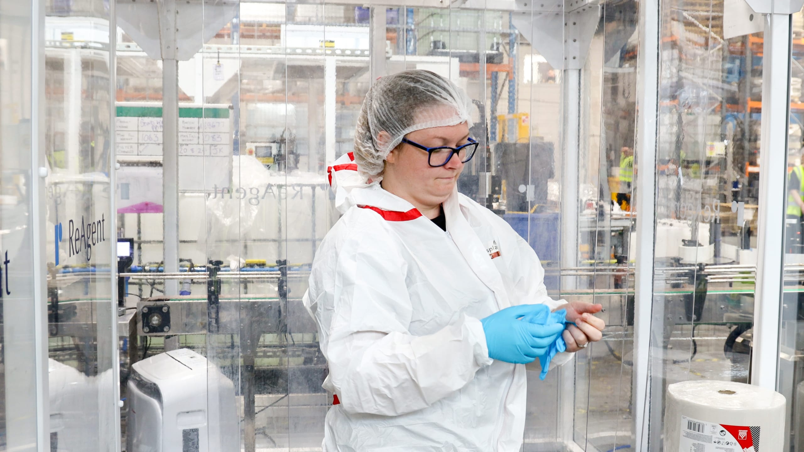 Lab technician following cleanroom standards