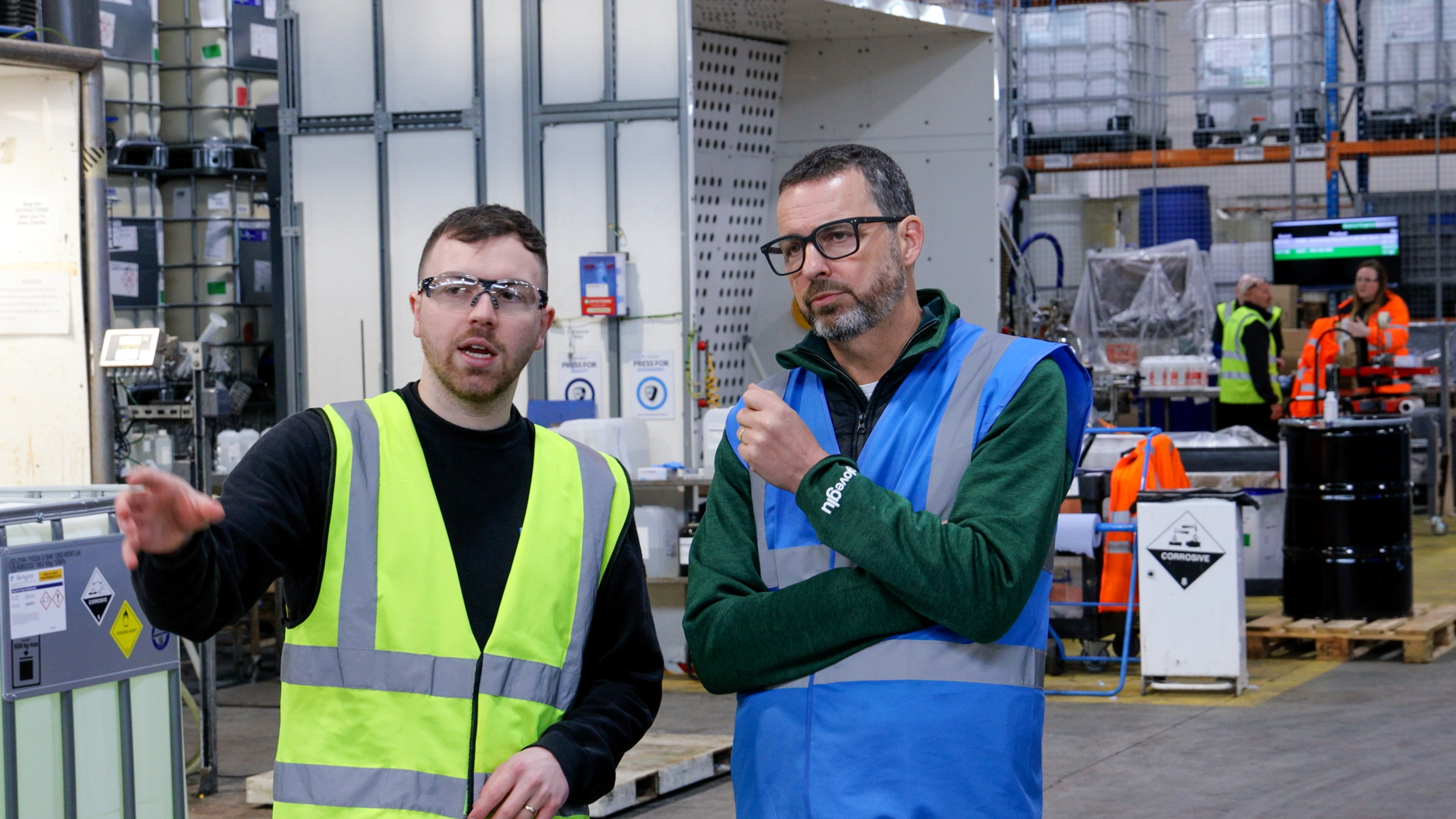 Glove Glu CEO and ReAgent walking through factory
