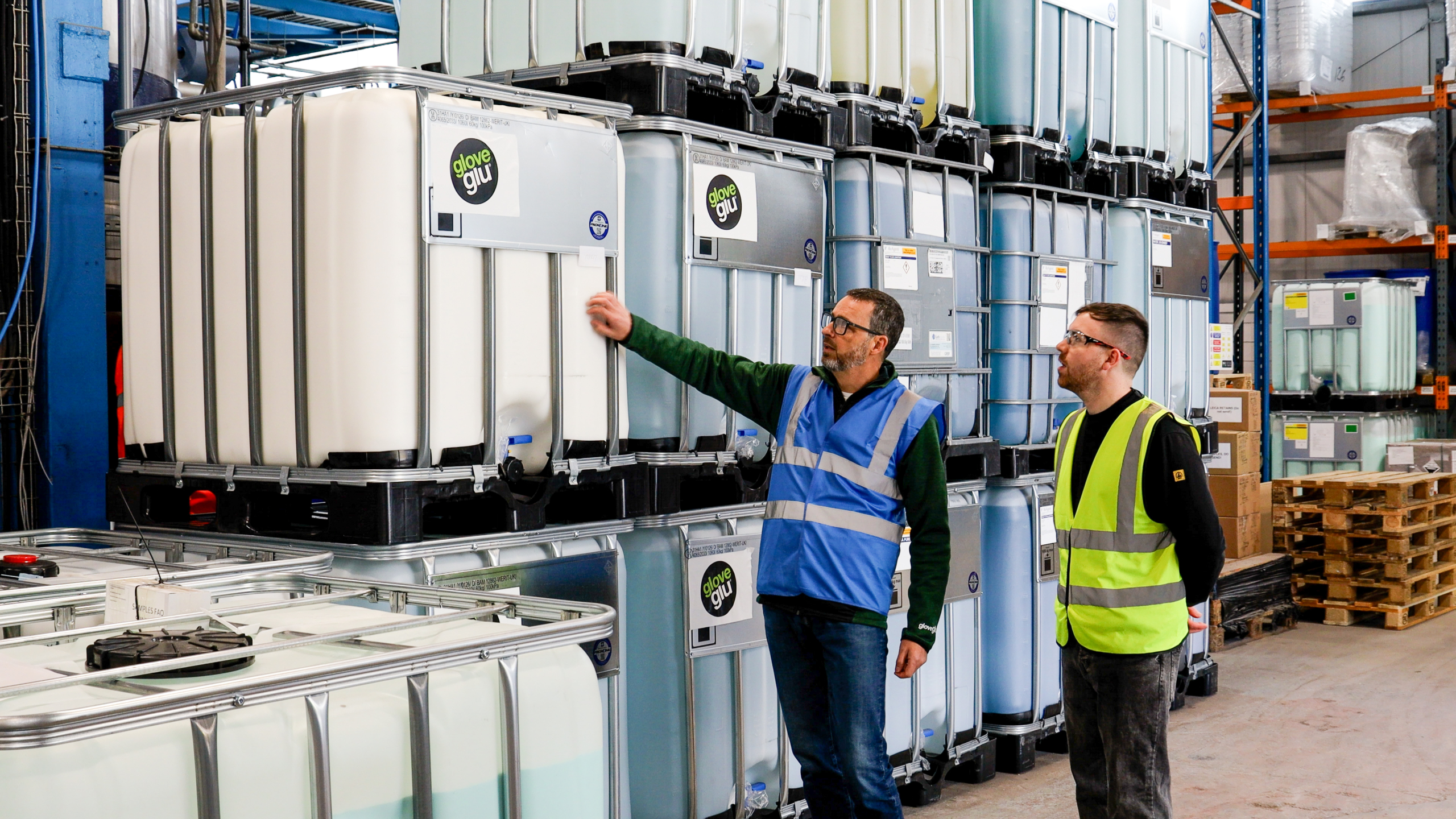 Glove Glu CEO inspecting ReAgent's bespoke IBCs