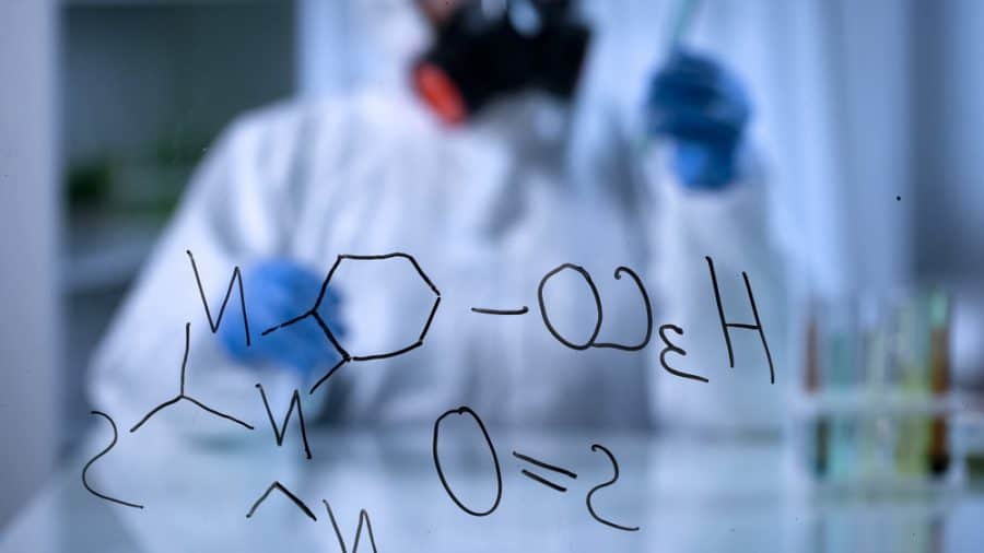 A toxicologist working in a chemical lab