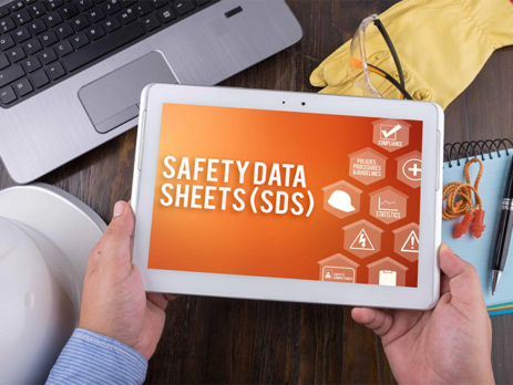 Updated to SAFETY DATA SHEETS (SDS) on tablet||MSDS Requirements graphic with GHS labels||shutterstock_1108860113