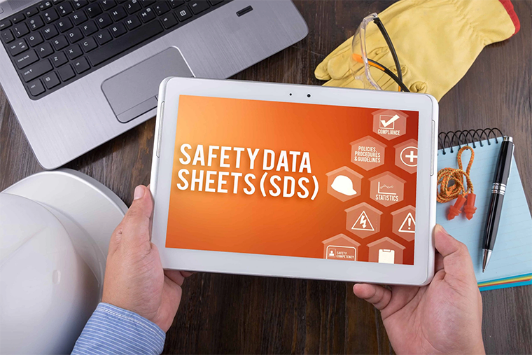 Updated to SAFETY DATA SHEETS (SDS) on tablet||MSDS Requirements graphic with GHS labels||shutterstock_1108860113
