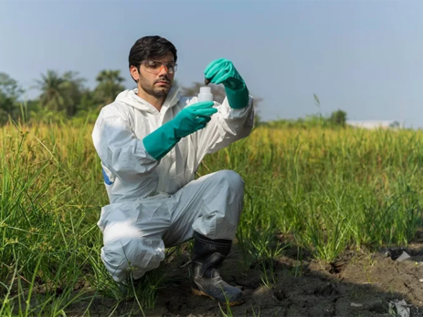 A scientist collecting soil samples in a field||Weddell