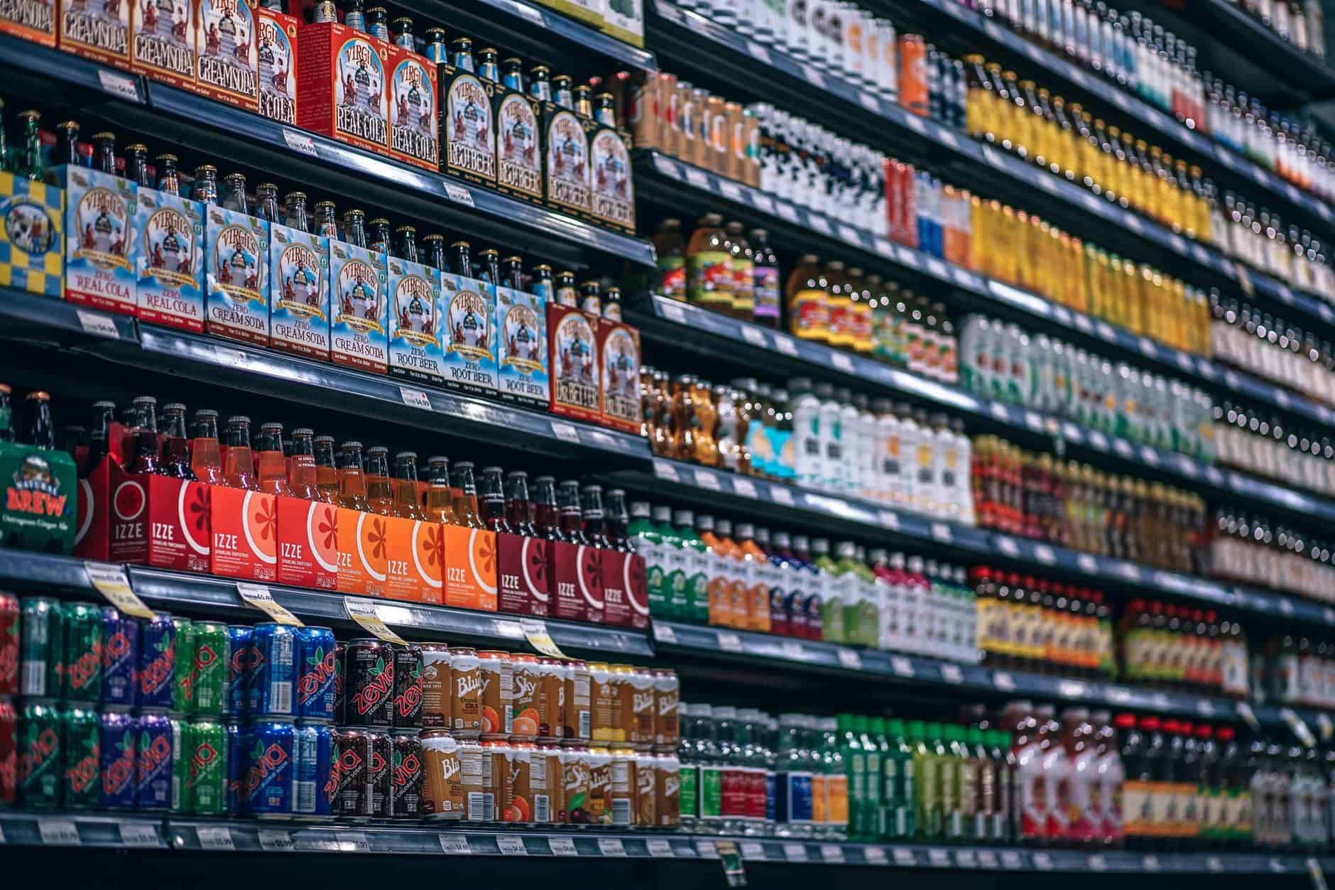 The soda can protects against the acidity of fizzy drinks
