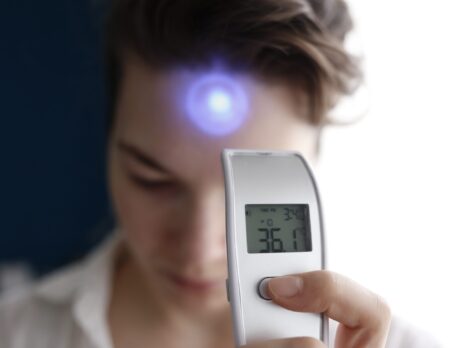 Someone taking a woman's temperature with a contactless thermometer||A graphic showing the formula for calculating heat change in a chemical reaction||A graphic showing the formula of calculating change in chemical temperature||A graphic demonstrating the formation of glucose||A graphic showing the formula for calculating heat change in a chemical reaction||A graphic showing the formula of calculating change in chemical temperature||A graphic demonstrating the formation of glucose